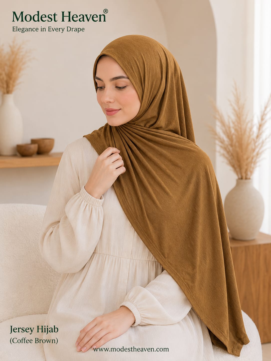Woman wearing coffee brown premium jersey hijab, seated portrait view
