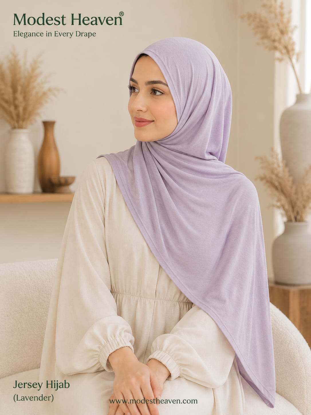 Woman wearing lavender premium jersey hijab, seated portrait view