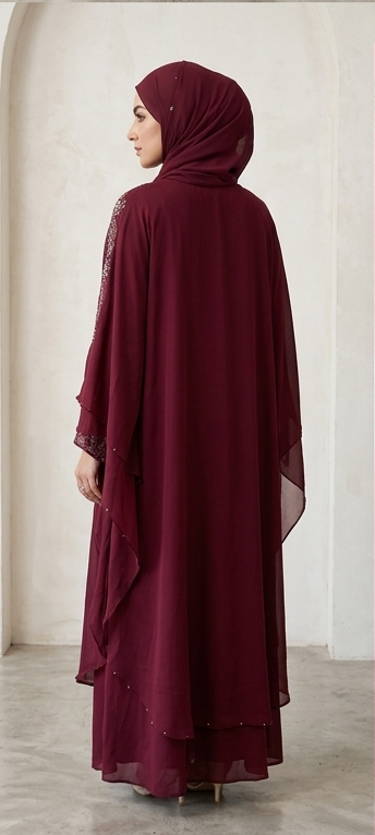 Back view of maroon kaftan abaya with flowing tiered silhouette and matching hijab