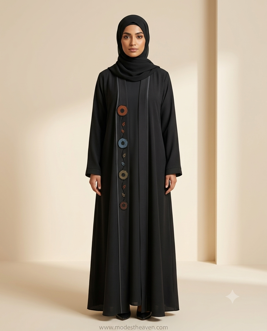 Woman wearing mauve embroidered open abaya with black floral motifs and hijab