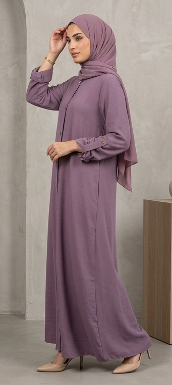 Woman wearing mauve purple button-down abaya with mandarin collar and matching hijab, full-length