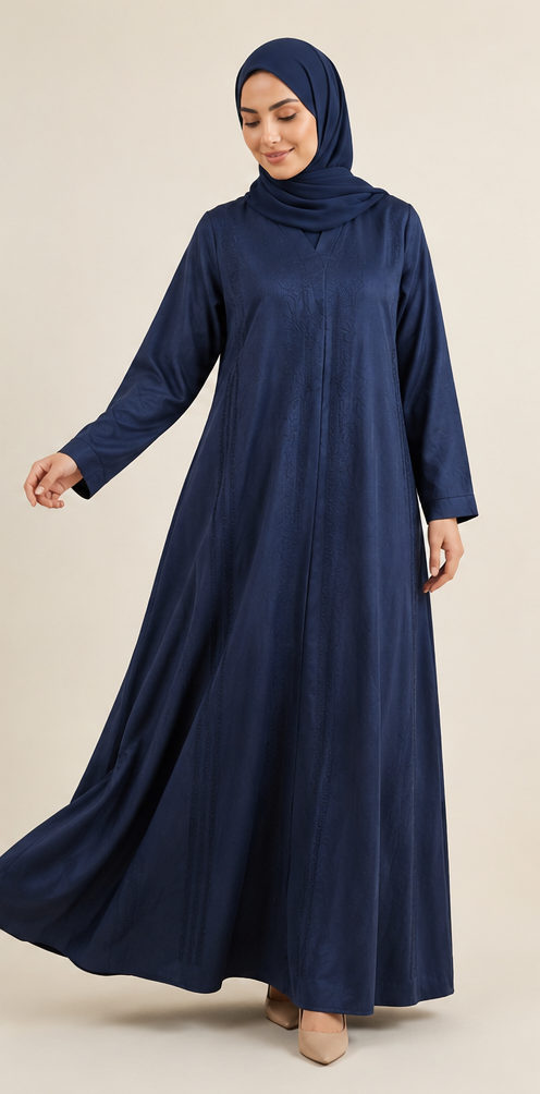 Woman wearing navy blue jacquard closed abaya with matching hijab full length front view